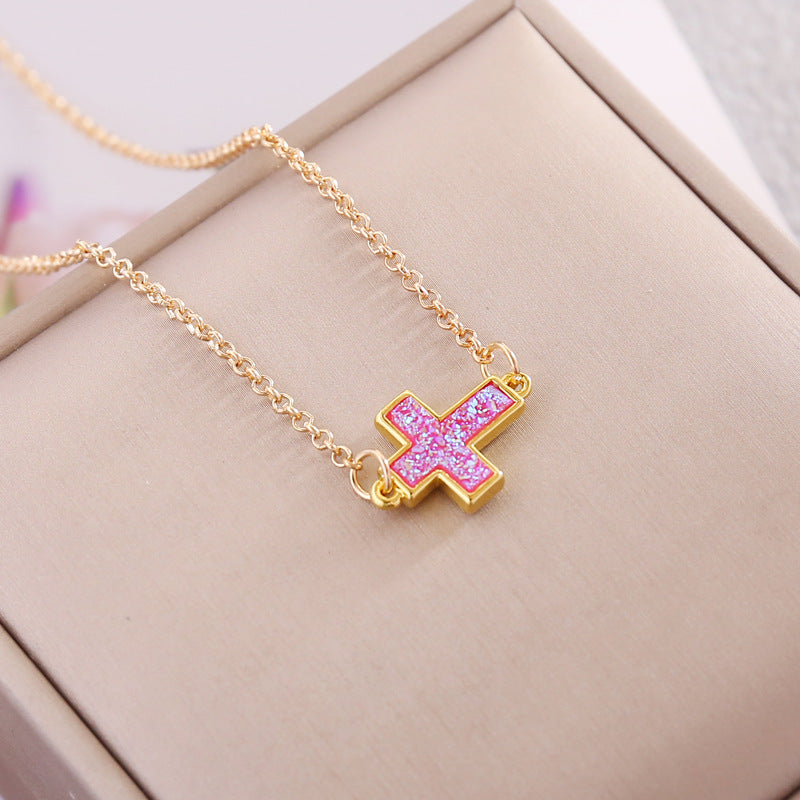 Multicolor Cross Necklace – Vibrant gold chain with pink cross pendant, stylish gothic faith jewelry for women.