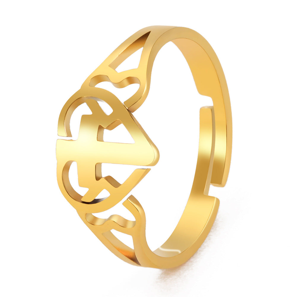Stainless Steel Love Cross Ring – Minimalist Christian Faith Jewelry showcasing a gold cross design.