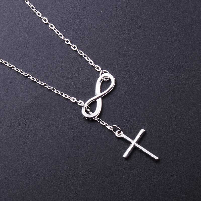 Hollow Cross Clavicle Necklace featuring an infinity symbol and cross pendant in silver