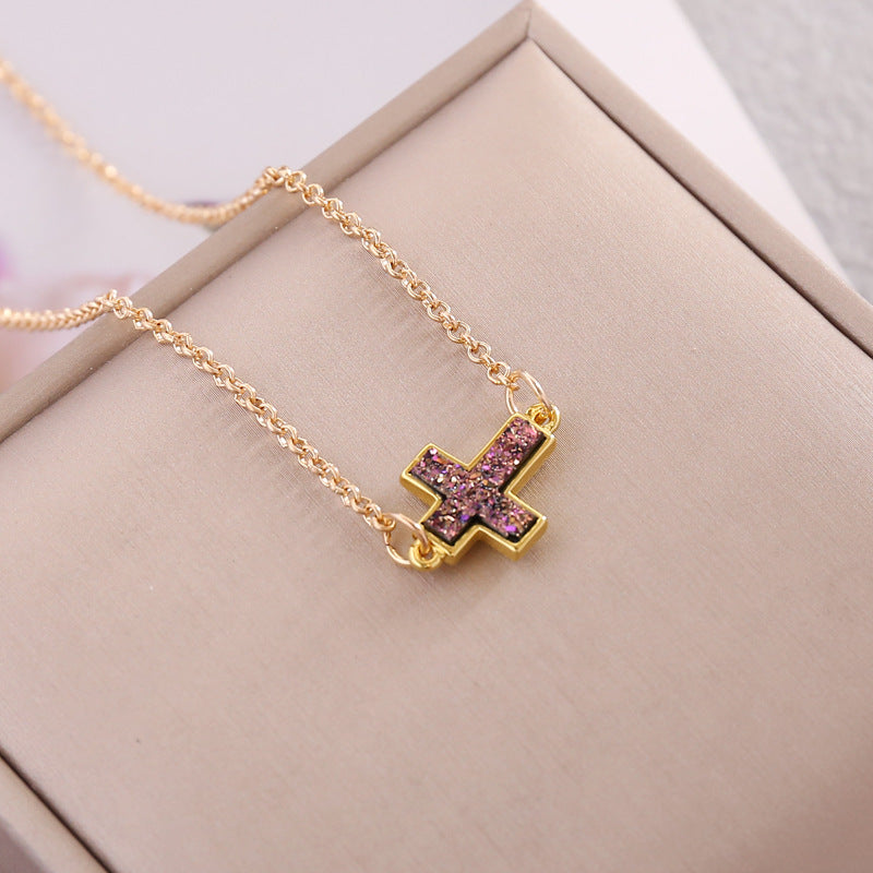 Multicolor Cross Necklace with pink and gold pendant on delicate chain, perfect for trendy gothic faith jewelry.